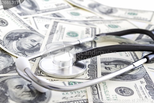 Image of Money and stethoscope, medical insurance