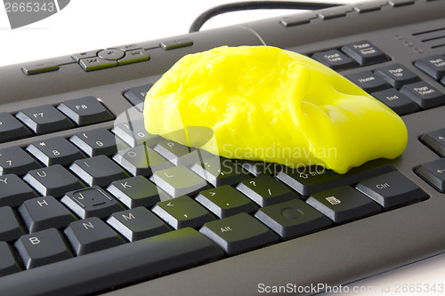 Image of cleaning keyboard sponge