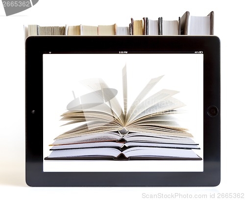 Image of Open Books on digital tablet concept