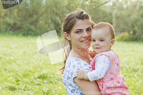 Image of Baby girl with her mother