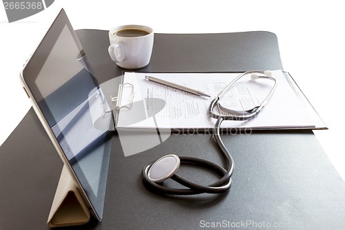 Image of Tablet Pc and Stethoscope on desk 