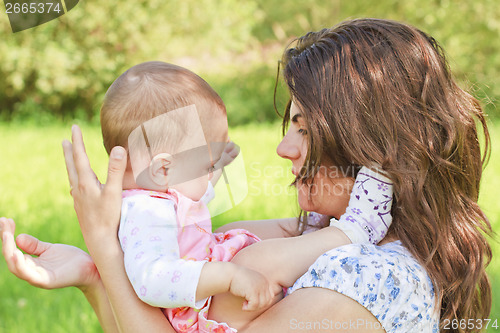 Image of Happy mother with child