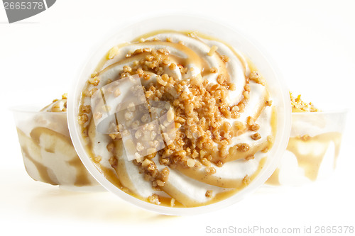 Image of vanilla ice cream with caramel topping