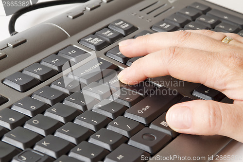 Image of press enter on keyboard