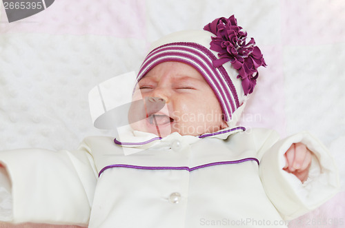 Image of Crying newborn baby girl