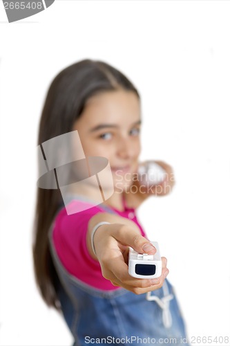 Image of teenage girl playing video games 