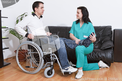 Image of Physical therapist working with patient