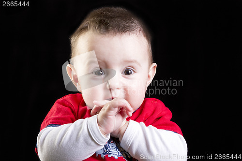 Image of Baby boy on black background