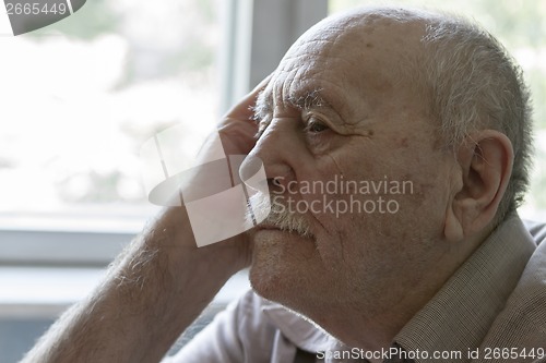 Image of senior man thinking