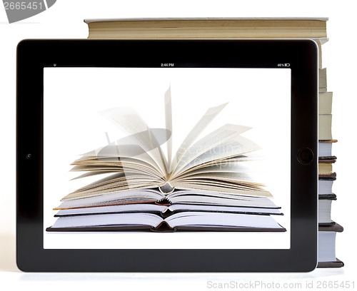Image of Open Books on digital tablet concept