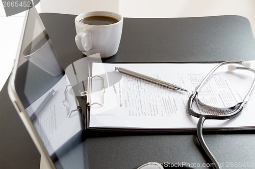 Image of Tablet Pc and Stethoscope on desk 