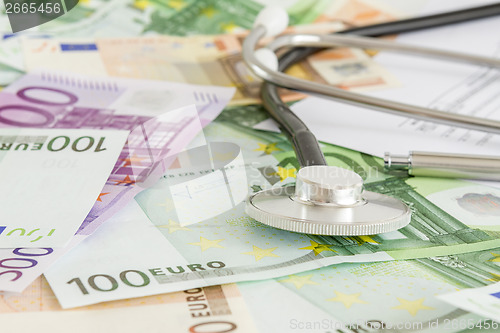 Image of Money and stethoscope, medical insurance