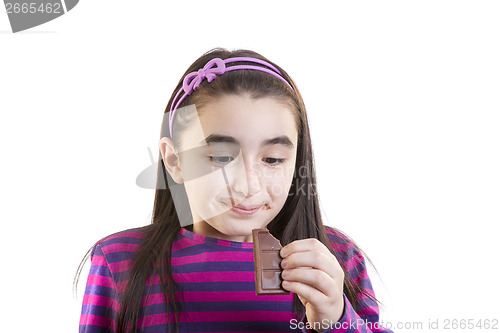 Image of Little girl eating chocolate