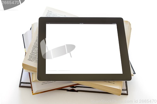 Image of Open Books and blank screen digital tablet concept