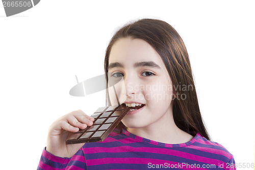 Image of Young girl eating chocolate