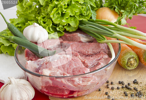 Image of Fresh beef meat with vegetables 