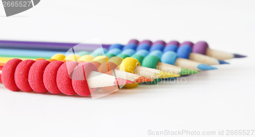 Image of Pencils arranged in color order of the rainbow