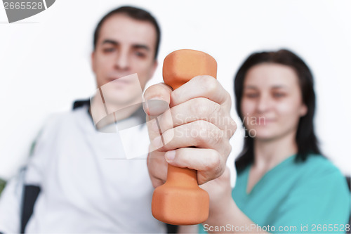 Image of Physical therapist working with patient