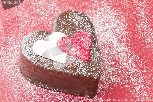 Image of Heart shaped slice of a chocolate-cake