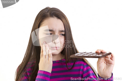 Image of Girl child with toothache 