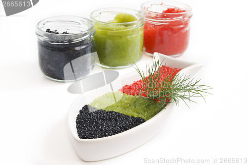 Image of CAVIAR IN THE OPEN GLASS CONTAINERS