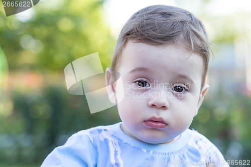 Image of Baby boy portrait outside