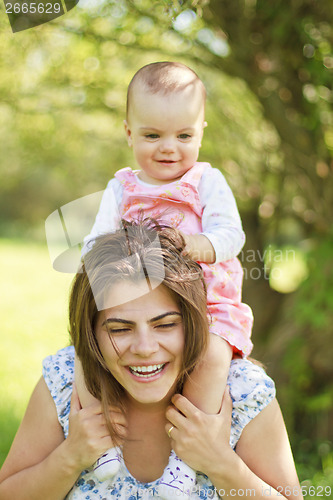 Image of happy mother with her child 