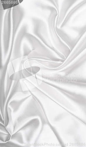 Image of Smooth elegant white silk as background 