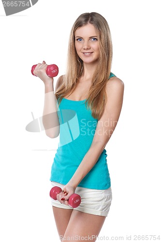 Image of Young teen girl with dumbbells