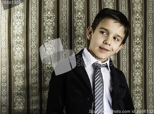 Image of Boy in vintage suit