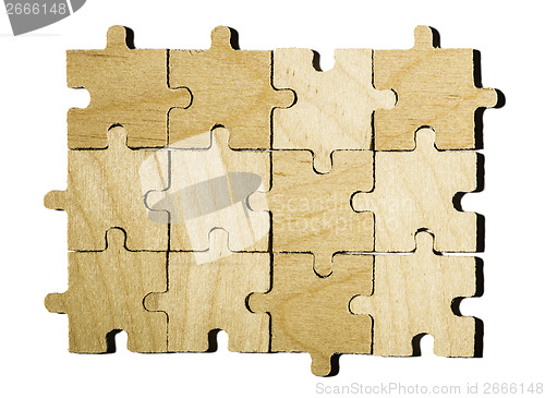 Image of Wooden puzzle on white background. 