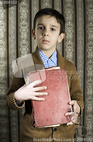Image of Child with red vintage book
