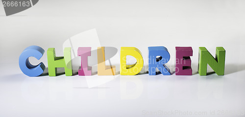 Image of Multicolored text children made of wood.