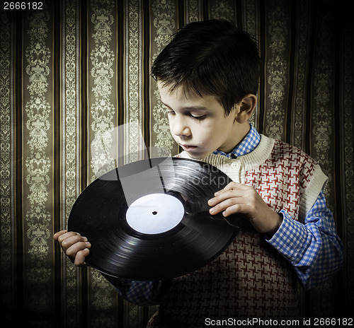 Image of Child hold lp