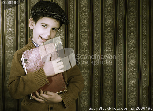 Image of Child with red vintage book