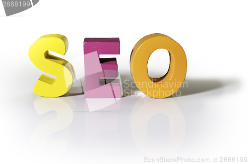 Image of Multicolored word seo made of wood.