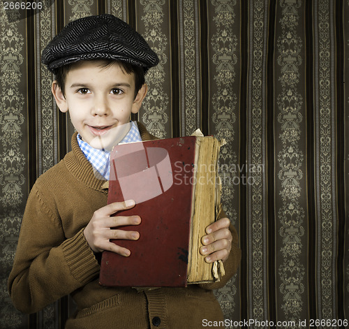 Image of Child with red vintage book