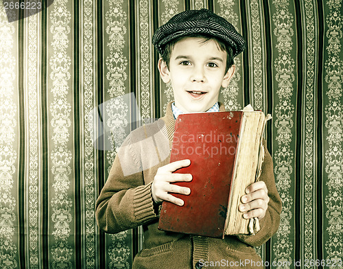 Image of Child with red vintage book