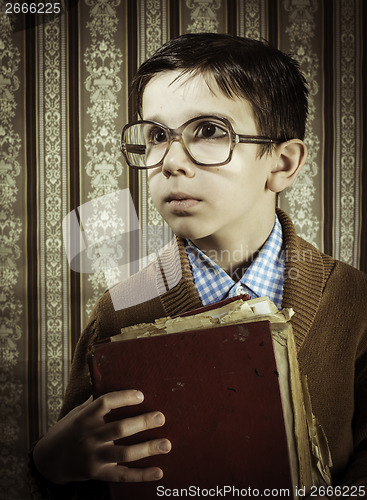 Image of Child with red vintage book