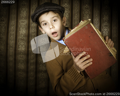 Image of Child with red vintage book