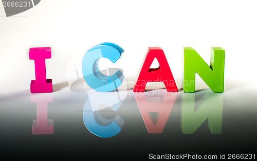 Image of Multicolored text I can made of wood.