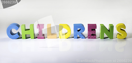 Image of Multicolored text childrens made of wood.