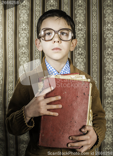 Image of Child with red vintage book