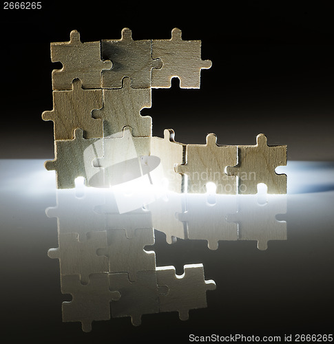 Image of Wooden puzzle and backlight background. Close up