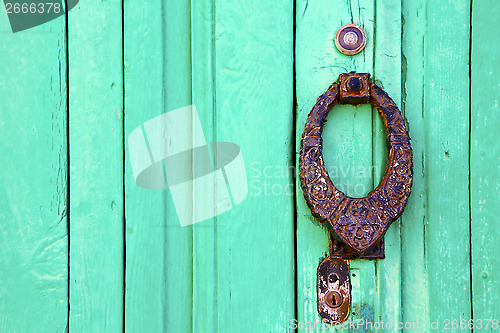 Image of knocker lanzarote abstract door wood in the green 