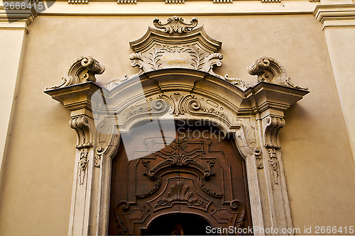 Image of  church door and yellow wall lugano Switzerland Swiss  