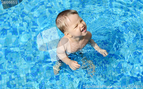 Image of kid in the pool