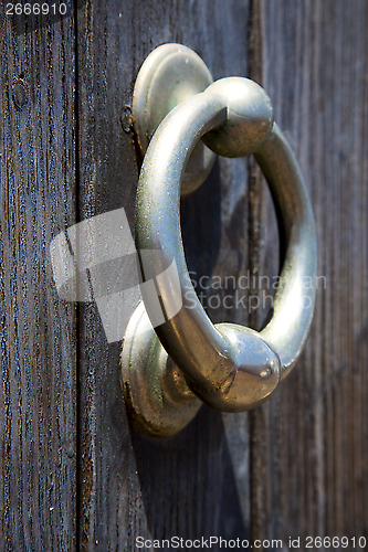 Image of knocker abstract door wood in the brown spain