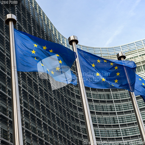 Image of European Union flags in front of the Berlaymont building (Europe