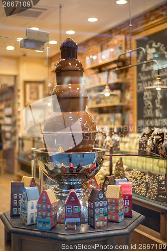 Image of chocolate fountain in belgium shop